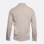 A light beige long-sleeve button-up shirt shown from the back, displayed on a clean, light gray background. PAIGE Shirt available at Sakks Menswear in Southampton.