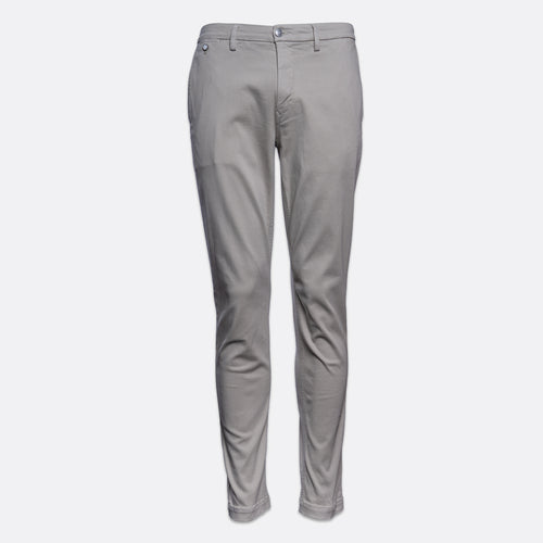 A pair of slim-fit, light gray chino pants shown on a clean, light gray background. Replay Chinos available at Sakks Menswear in Southampton.
