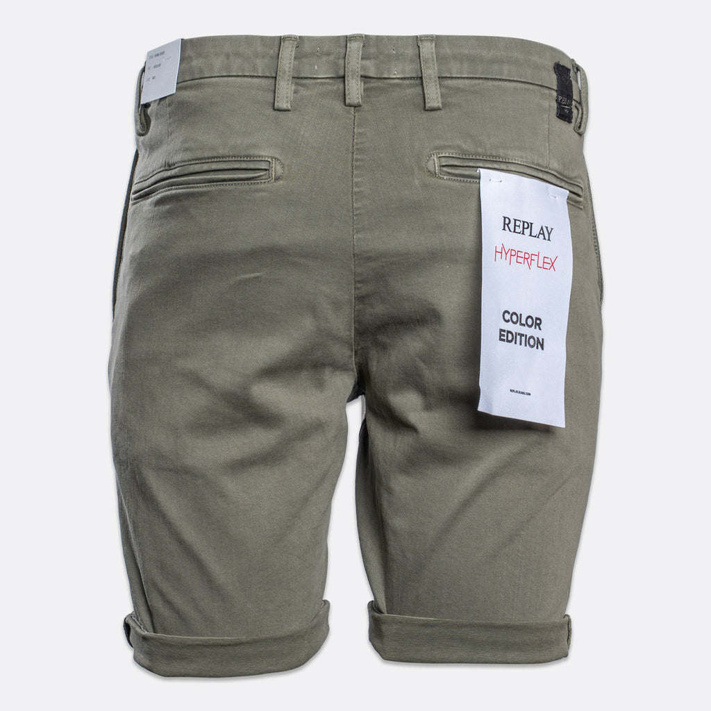 Back view of olive green Replay HyperLex Color Edition shorts with a white product tag attached to the back pocket. Replay Shorts available at Sakks Menswear in Southampton.