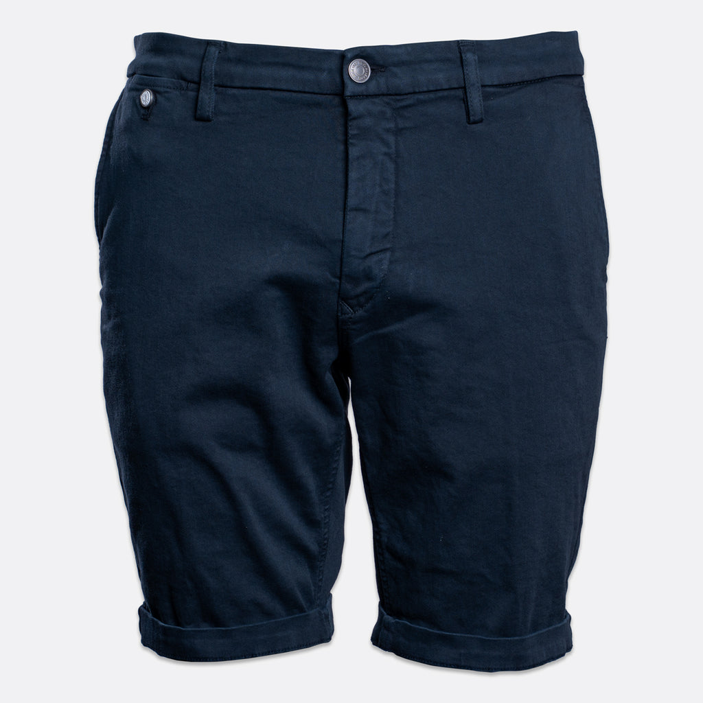 A pair of dark navy blue chino shorts with a rolled hem and silver metal buttons, shown against a plain light gray background. Replay Shorts available at Sakks Menswear in Southampton.