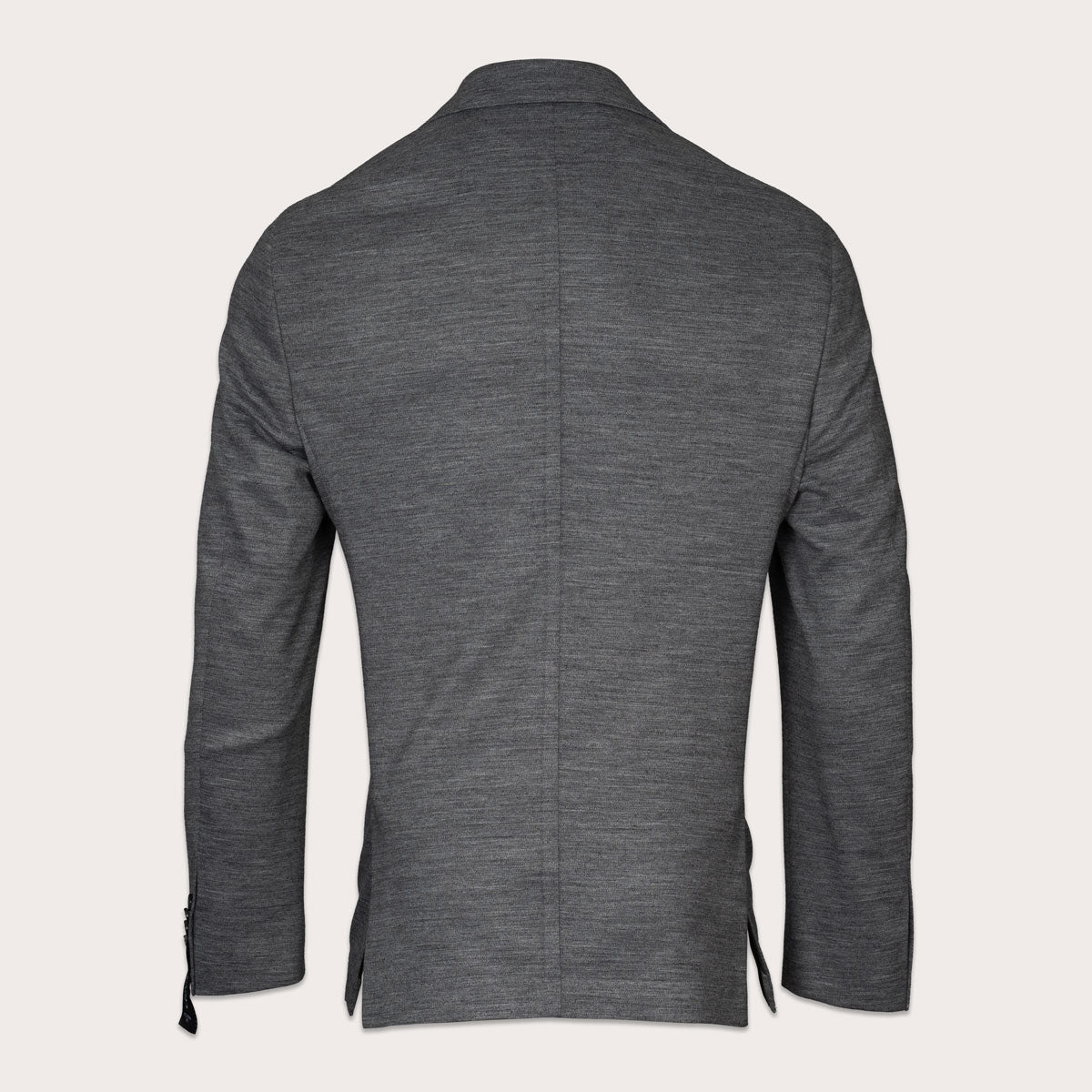 A dark gray heathered blazer shown from the back, featuring a central seam, notched lapels, and side slits near the hem, displayed on a light beige background. Sand Copenhagen Blazer available at Sakks Menswear in Southampton.