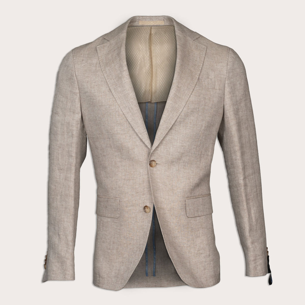 A light beige textured linen blazer with notched lapels and two brown buttons, displayed on a mannequin against a light cream background. Sand Copenhagen Blazer available at Sakks Menswear in Southampton.
