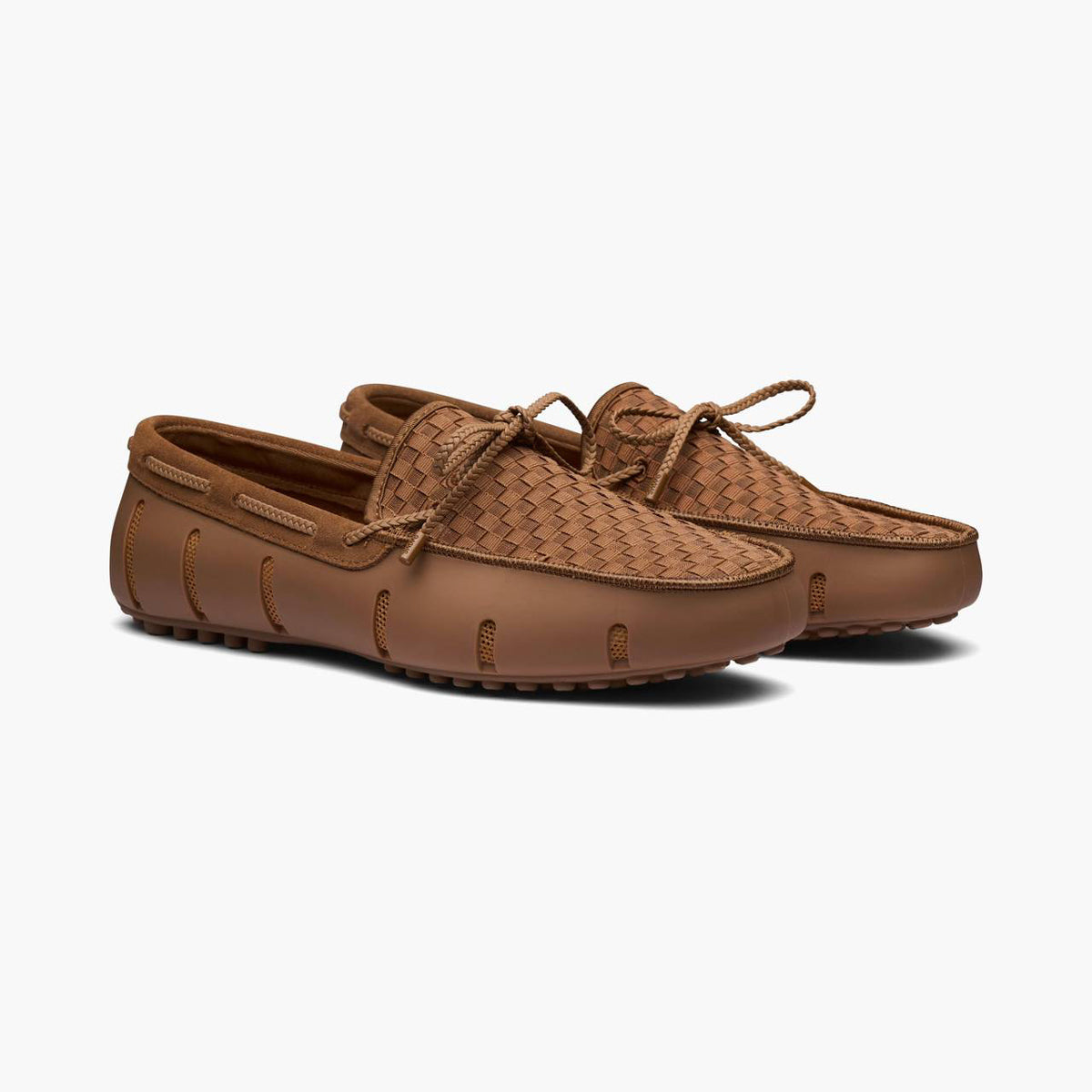 Black car boot liner on a white background. SWIMS Loafers available at Sakks Menswear in Southampton.