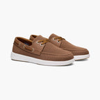 Pair of beige loafers on a white background. SWIMS Boat Shoes available at Sakks Menswear in Southampton.
