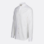 A white long-sleeve button-down shirt with a pointed collar and light-colored buttons, shown on a light gray background. SWIMS Shirt available at Sakks Menswear in Southampton.