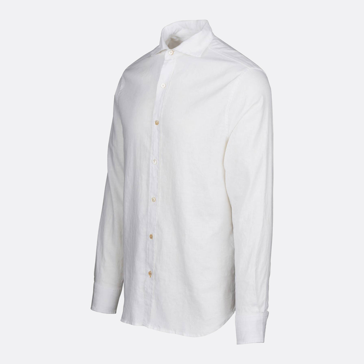 A white long-sleeve button-down shirt with a pointed collar and light-colored buttons, shown on a light gray background. SWIMS Shirt available at Sakks Menswear in Southampton.