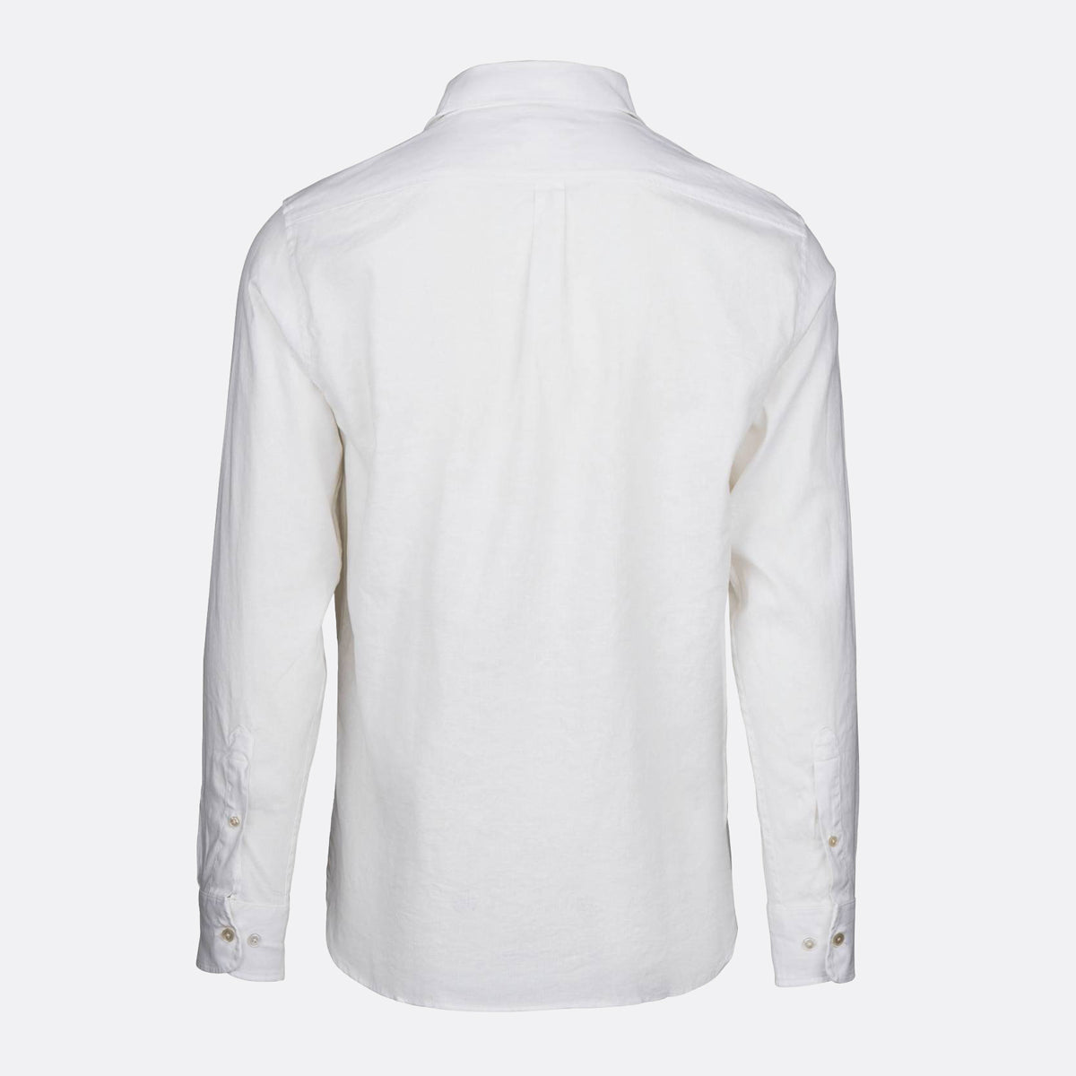 A white long-sleeve button-up shirt shown from the back, featuring a classic collar and button cuffs, displayed on a clean light gray background. SWIMS Shirt available at Sakks Menswear in Southampton.