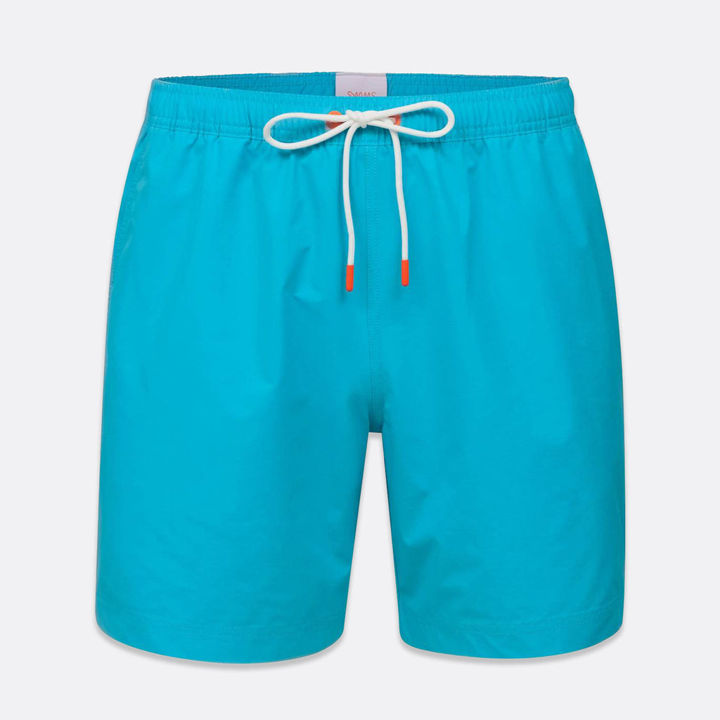 Bright turquoise blue swim shorts with a white drawstring and small orange accents, shown on a light gray background. SWIMS Swim Shorts available at Sakks Menswear in Southampton.