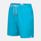 Bright turquoise blue swim shorts with a white drawstring and small orange accents, shown on a light gray background. SWIMS Swim Shorts available at Sakks Menswear in Southampton.