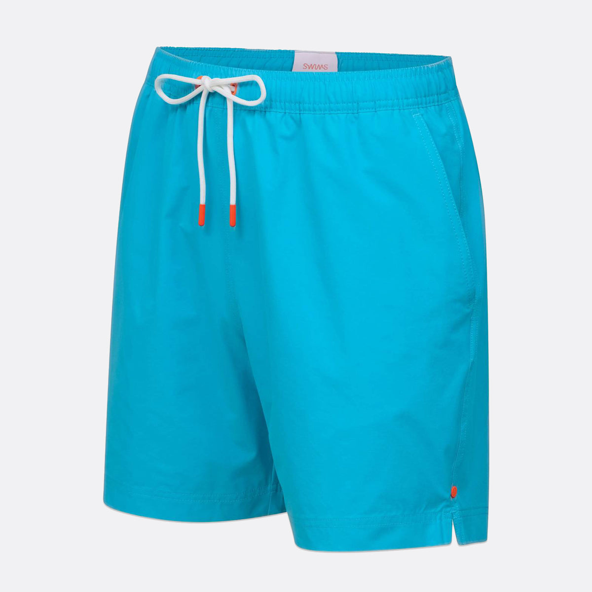 Bright turquoise blue swim shorts with a white drawstring and small orange accents, shown on a light gray background. SWIMS Swim Shorts available at Sakks Menswear in Southampton.
