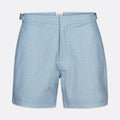 Light blue shorts with a small repeating dark blue geometric pattern, shown flat against a light gray background. SWIMS Swim Shorts available at Sakks Menswear in Southampton.
