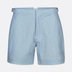 Light blue shorts with a small repeating dark blue geometric pattern, shown flat against a light gray background. SWIMS Swim Shorts available at Sakks Menswear in Southampton.