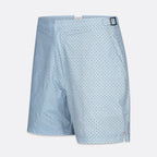 Light blue patterned shorts with a small repeating geometric print, shown on a light gray background. SWIMS Swim Shorts available at Sakks Menswear in Southampton.