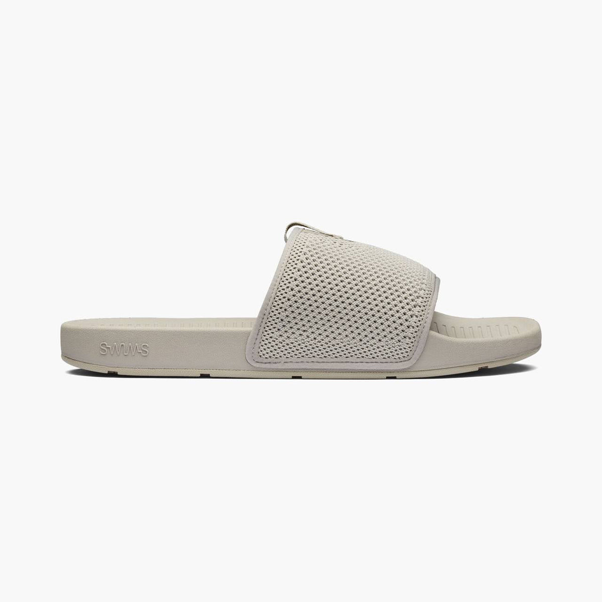 White slide sandal on a white background. SWIMS Slides available at Sakks Menswear in Southampton.