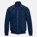A navy blue lightweight zip-up jacket with a stand-up collar, ribbed cuffs, and a ribbed hem, shown against a light gray background. UBR Jacket available at Sakks Menswear in Southampton.