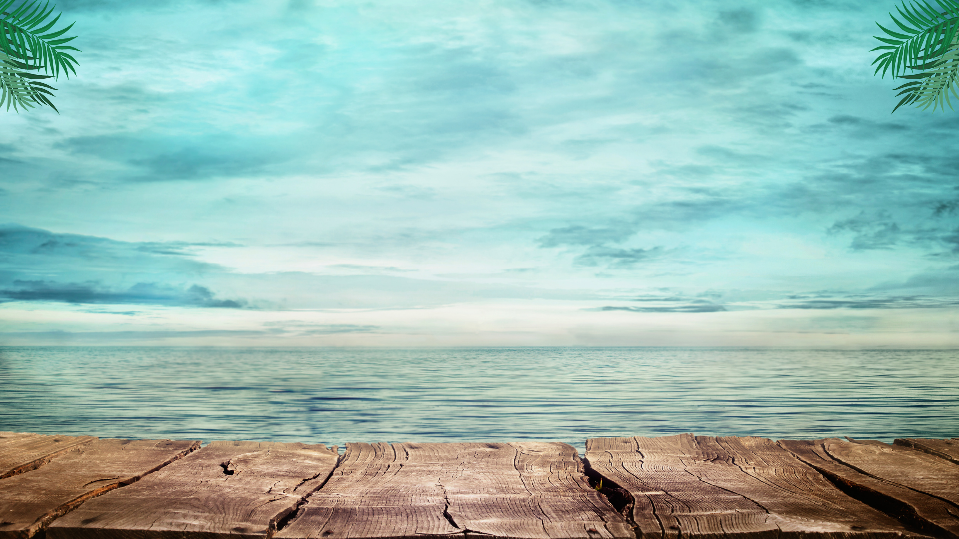 A tropical beach scene with a weathered wooden deck in the foreground, calm blue water, and a cloudy sky in shades of teal and light blue, with palm leaves in the corners. Sakks Menswear Sale available in Southampton.