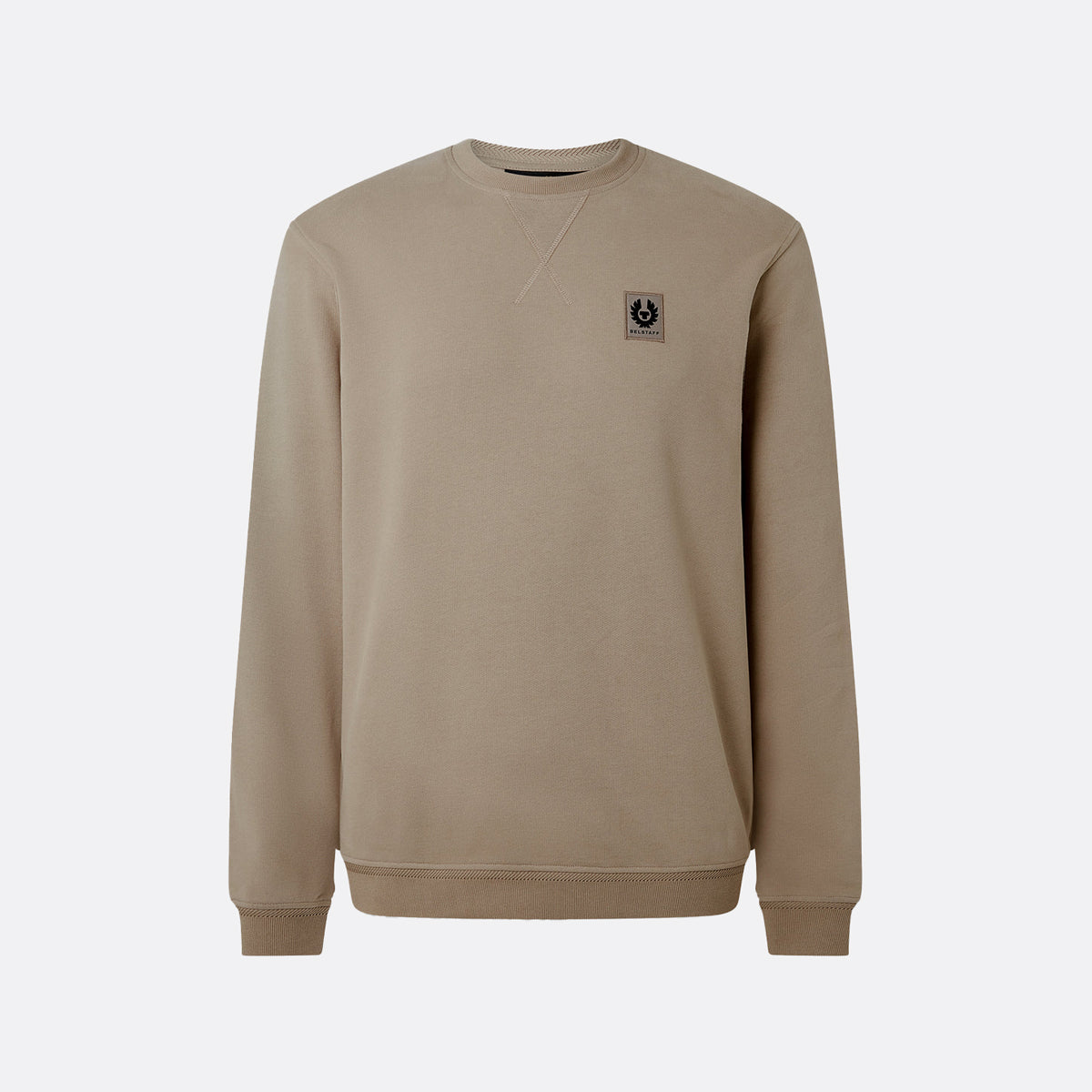 A beige crewneck sweatshirt with a small embroidered logo patch on the left chest, displayed on a clean light gray background. Belstaff Sweatshirt. Sakks Menswear Southampton.